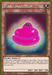 Image of a Yu-Gi-Oh! trading card: "Marshmacaron [MVP1-ENG13] Gold Rare," a Gold Edition Effect Monster. The card depicts a pink, glossy, marshmallow-like creature with big, expressive eyes. As a Fairy/Effect type with 200 ATK and 200 DEF, its special ability involves summoning other "Marshmacaron" cards from the deck or graveyard.
