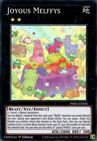A Yu-Gi-Oh! trading card titled "Joyous Melffys [PHRA-EN044] Super Rare" from the Phantom Rage series. The Xyz/Effect Monster features two brightly colored, cartoonish creatures resembling stuffed animals sitting on a grassy field among flowers and fruits. The card includes stats: ATK 2000, DEF 500, and descriptions of its effects.