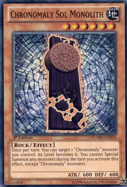 Image of the "Chronomaly Sol Monolith [NUMH-EN004] Super Rare" Yu-Gi-Oh! trading card. The Effect Monster card features an ancient, weathered monolith with a circular stone mechanism at the top and intricate carvings. It's a 1st edition card, with type “Rock/Effect,” 600 ATK, 600 DEF, and detailed effect text at the bottom.