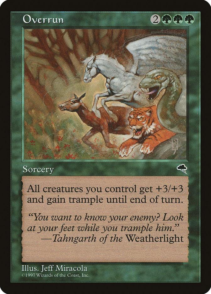 The Magic: The Gathering card "Overrun [Tempest]" showcases artwork by Jeff Miracola, featuring a wolf, tiger, and deer charging forward and led by a winged horse against the backdrop of a dense forest. This sorcery card's text reads: "All creatures you control get +3/+3 and gain trample until end of turn.