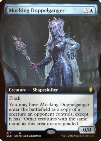 A Magic: The Gathering card titled "Mocking Doppelganger (Extended Art) [Commander Legends: Battle for Baldur's Gate]" from the Commander Legends series. It shows an ethereal, armored creature with blue glowing elements. The card is of rarity "R" and has the ability "Flash." Its mana cost is 3 blue. The text describes its copying and goading abilities. Illustrator: Igor Grechanyi.