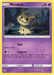A Holo Rare Pokémon card, Mimikyu (58/145) [Sun & Moon: Guardians Rising] from Pokémon, featuring Mimikyu with 70 HP. Mimikyu is surrounded by spooky dark scenery. The card details two moves: Filch (draw 2 cards) and Copycat (mimic a non-GX attack used by the opponent's Pokémon last turn). Includes its weight, height, resistance, and retreat cost information.