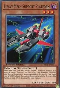 A "Yu-Gi-Oh!" card named "Heavy Mech Support Platform [SBCB-EN066] Common" with 3 stars, dark attribute, and a machine/union/effect type. The image depicts a mechanized, grey and red flying vehicle. The card's stats are 500 ATK and 500 DEF. It's part of the Battle City Box Speed Duel series and features its unique abilities in the text box.