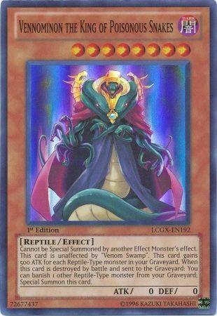 A Super Rare Yu-Gi-Oh! trading card titled "Vennominon the King of Poisonous Snakes [LCGX-EN192] Super Rare." This Reptile-Type Effect Monster has a dark attribute and depicts a snake-like creature with a regal appearance and glowing symbols. It boasts 0 attack and 0 defense strength, with detailed effect text at the bottom.