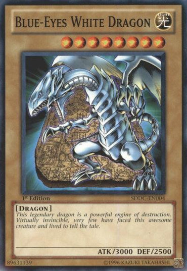 The Blue-Eyes White Dragon [SDDC-EN004] Common card from the Yu-Gi-Oh! brand is a Normal Monster from the Dragons Collide Structure Deck. It showcases an image of a powerful, metallic dragon set against a blue and brown background. This 1st Edition card has eight stars, an attack power of 3000 points, and a defense power of 2500 points. Its card ID is SDDC-EN004.