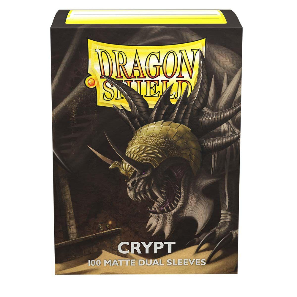 The image depicts a box of Dragon Shield: Standard 100ct Sleeves - Crypt (Dual Matte) by Arcane Tinmen, featuring a dark dragon in armor and shadows. The packaging confirms it includes 100 sleeves with opaque black interiors.