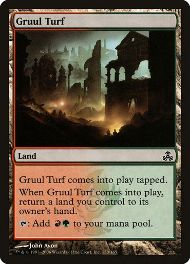 Magic: The Gathering card titled "Gruul Turf [Guildpact]." This "Land" card from Guildpact features a ruined, ancient city with arches and crumbling buildings. "Gruul Turf [Guildpact] comes into play tapped. When it does, return a land you control to its owner's hand. Tap: Add red and green mana." Art by John Avon, 158/165.