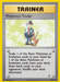 A rare Pokémon trading card named "Pokemon Trader (103/110) [Legendary Collection]" from the Pokémon series, featuring a yellow border. This Trainer card shows a man in a suit holding a Poké Ball with an Eevee beside him. Text reads: "Trade 1 of the Basic Pokémon or Evolution cards in your hand for 1 from your deck. Show both cards to your opponent. Shuffle your deck afterward." Illustrated