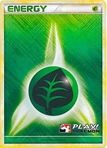 A Pokémon Trading Card depicting a green and black stylized leaf symbol, representing Grass Energy. The background features shades of green with a dynamic light pattern. The top of the card reads "ENERGY," and the bottom displays the "Play! Pokémon" logo with a Poké Ball and text, indicating its Promo Rarity status. This is the Grass Energy (2010 Play Pokemon Promo) [League & Championship Cards] from Pokémon.