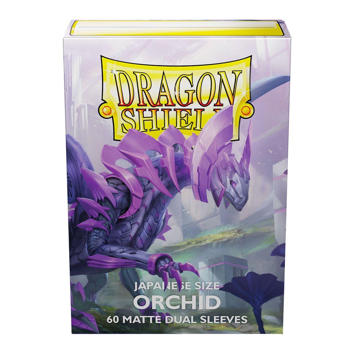 The Arcane Tinmen Dragon Shield box showcases a purple dragon-like creature with sharp features. It reads 