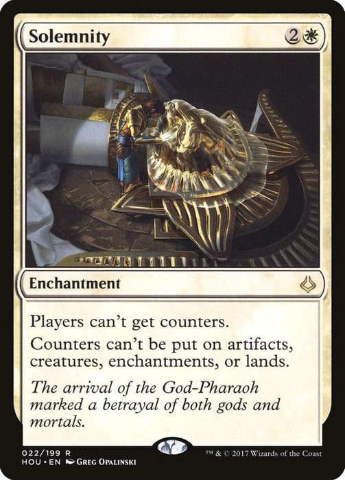 A "Solemnity [Hour of Devastation]" Magic: The Gathering card from the Hour of Devastation set with a white border. This rare enchantment features an elaborate gold burial mask and ornate artifact. The spell costs two mana and one white mana, with text reading: “Players can't get counters. Counters can’t be put on artifacts, creatures, enchantments, or lands.”