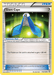 The image shows a Pokémon Trainer card named "Giant Cape (114/124) [Black & White: Dragons Exalted]" from the "ITEM" category in the Pokémon series. The card background is silver and blue, with an illustration of a large blue cape with white trim, tied with a green gem clasp. This Uncommon card increases a Pokémon's HP by 20. Card number is 114/124.