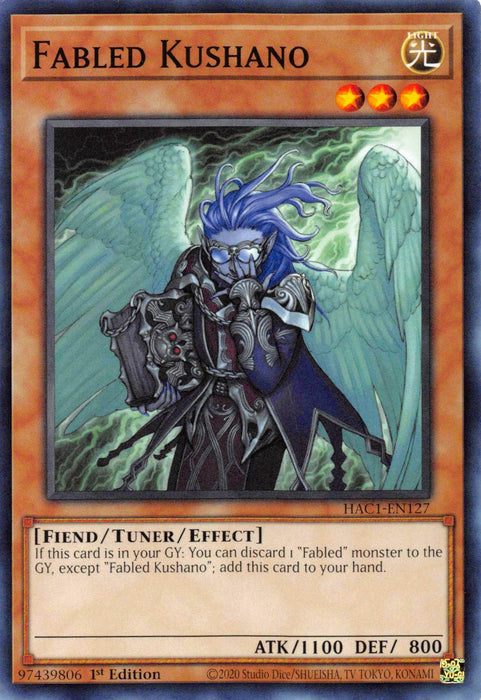The image showcases a "Yu-Gi-Oh!" trading card named "Fabled Kushano [HAC1-EN127] Common" from Hidden Arsenal: Chapter 1. It depicts a blue-skinned, humanoid figure with wings, long hair, and a lizard-like tail. This Fiend Tuner monster has 1100 ATK and 800 DEF points and can be retrieved by discarding "Fabled" monsters.