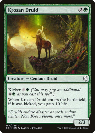 The Magic: The Gathering card "Krosan Druid [Dominaria]" features a centaur druid on a lush cliff, wielding a glowing green staff. It costs two generic and one green mana and includes a Kicker ability to gain life.