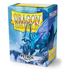 Arcane Tinmen's Dragon Shield "Petrol Matte" sleeves feature 100 stylish, protective standard size card sleeves with a blue dragon on icy terrain and bold yellow branding, ensuring your cards are both secure and fashionable.