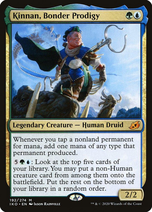 A Magic: The Gathering product titled "Kinnan, Bonder Prodigy [Ikoria: Lair of Behemoths]". The legendary creature depicts a young human druid riding a green beast with large tusks. Kinnan wears ornate armor and holds a staff with blue energy. The card text details its abilities, showing 2/2 power and toughness in the lower right.