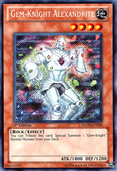 A Yu-Gi-Oh! trading card titled “Gem-Knight Alexandrite [HA05-EN004] Secret Rare” from Hidden Arsenal 5. It depicts a humanoid rock figure with crystalline features and pink glowing gems. The 1st Edition Effect Monster has 1800 ATK and 1200 DEF and was released in 2011.