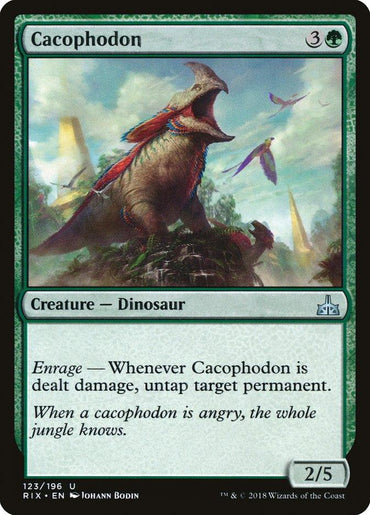 A Magic: The Gathering card named "Cacophodon [Rivals of Ixalan]" from Rivals of Ixalan with a casting cost of 3 colorless and 1 green mana. The image features a large dinosaur with sharp teeth and vibrant green scales roaring in a mountainous landscape. It has power/toughness of 2/5 and an Enrage mechanic that untaps a target permanent when it is dealt damage.