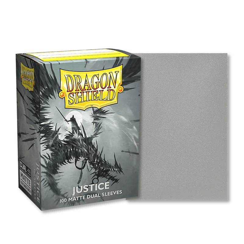 A box of Arcane Tinmen Dragon Shield: Standard 100ct Art Sleeves - Justice (Dual Matte) is seen alongside a single sleeve from the pack. The box features an illustration of a knight in black, spiked armor riding a dragon. Perfect for TCG cards, these dual matte sleeves display "Justice" on the front with "100 matte dual sleeves.