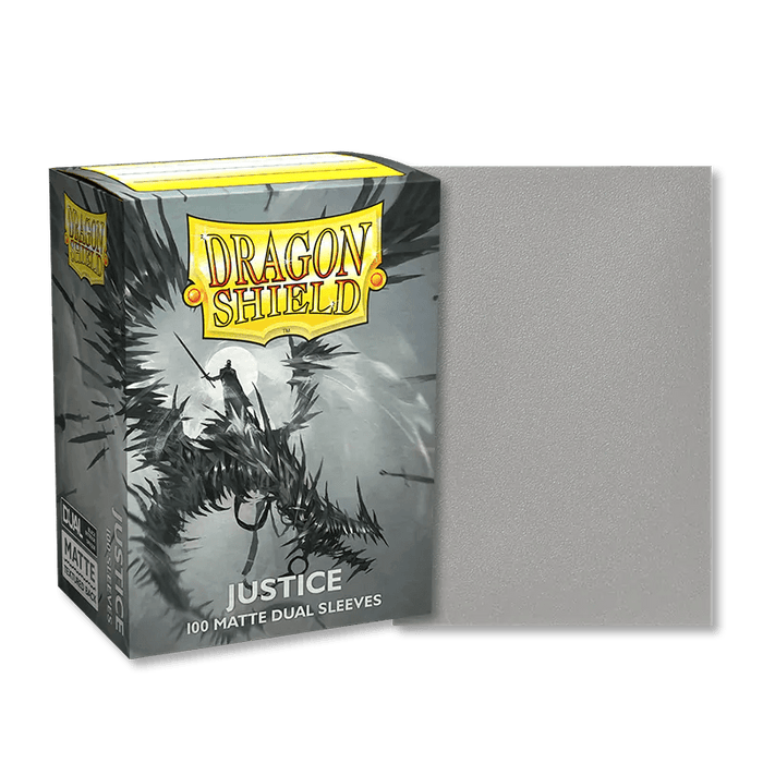 A box of Arcane Tinmen Dragon Shield: Standard 100ct Art Sleeves - Justice (Dual Matte) is seen alongside a single sleeve from the pack. The box features an illustration of a knight in black, spiked armor riding a dragon. Perfect for TCG cards, these dual matte sleeves display "Justice" on the front with "100 matte dual sleeves.