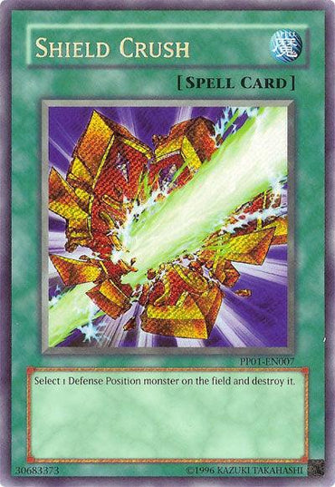 A "Shield Crush [PP01-EN007]" Secret Rare Yu-Gi-Oh! trading card from the Premium Pack 1. This Normal Spell card features a green background with a spell card icon in the top right corner. The artwork depicts a shield being shattered by a powerful green energy blast, and its effect reads, "Select 1 Defense Position monster on the field and destroy it.