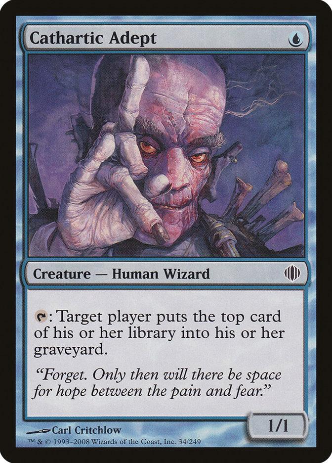 A Magic: The Gathering product titled "Cathartic Adept [Shards of Alara]," illustrated by Carl Critchlow. This Human Wizard from the Shards of Alara set features an aged, robed mage with pinkish skin, making a two-finger gesture. With a blue border and stats of 1/1, its ability reads: "Target player puts the top card of their library into their graveyard.