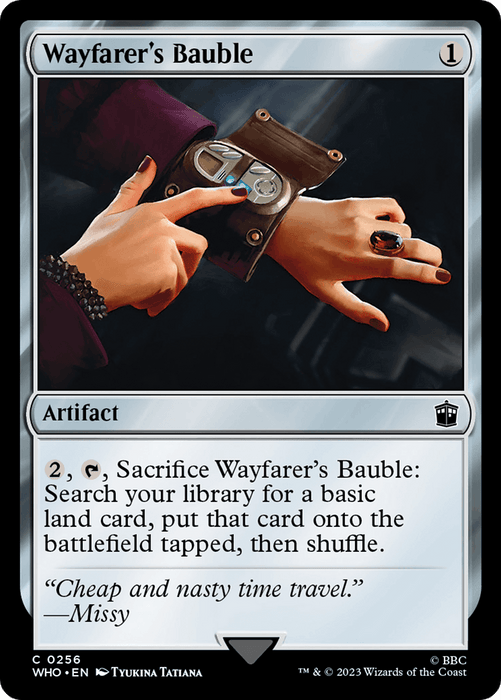 A Magic: The Gathering card titled "Wayfarer's Bauble [Doctor Who]" depicts a woman's hands holding a compass-like device. She wears a red ring and has painted nails. This artifact card details: 2, tap, Sacrifice Wayfarer's Bauble: Search for a basic land card, put it onto the battlefield tapped, then shuffle. Quote: "Cheap and nasty time travel." - Miss