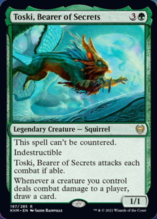 A Toski, Bearer of Secrets [Kaldheim] Magic: The Gathering card. This Legendary Creature features an illustration of a magical squirrel with a mythical, ethereal appearance. The text details its abilities: it cannot be countered, is indestructible, must attack each combat, and allows card draw when damage is dealt.