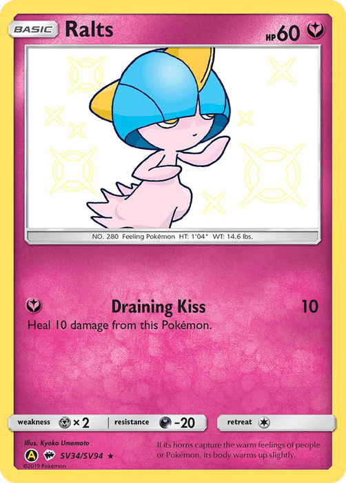 A Pokémon Ralts (SV34/SV94) [Sun & Moon: Hidden Fates - Shiny Vault] trading card featuring Ralts from the Hidden Fates series. The card background is pink with yellow accents. Ralts, a small bipedal Pokémon with a blue bowl-cut head and white body, is depicted with its eyes closed. It has 60 HP and an attack called "Draining Kiss" that heals 10 damage from Ralts.