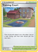 A Pokémon trading card titled "Training Court (169/192) [Sword & Shield: Rebel Clash]" from the "Trainer" category. It features an illustration of a brick house with a blue door and a lawn that has a Pokémon battle court painted on it, reminiscent of the Stadiums in Rebel Clash. Part of the Sword & Shield series, the card is number 169/192.