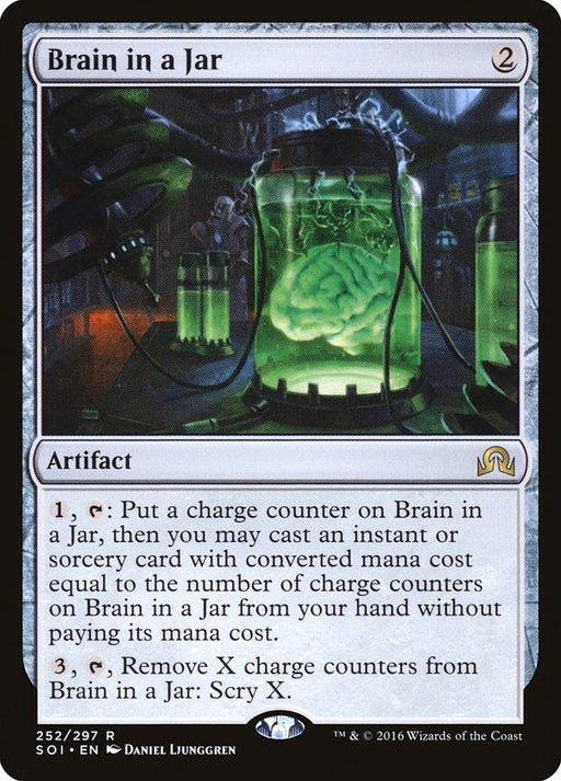 A Magic: The Gathering card titled "Brain in a Jar [Shadows over Innistrad]" from the Shadows over Innistrad (SOI) set. The artwork depicts a glowing green brain suspended in a jar with tubes and wires in a laboratory setting. This rare artifact card's abilities include casting spells and scrying.