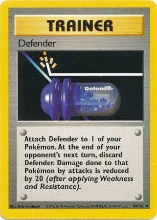 A Pokémon trading card titled "Defender (80/102) [Base Set Unlimited]" from the Base Set Unlimited with a yellow border and silver details. As an Uncommon card, it features an image of a blue cylindrical shield labeled "Defender." The card text explains how to use the Defender item in gameplay, reducing damage taken by 20 until the end of the next turn.