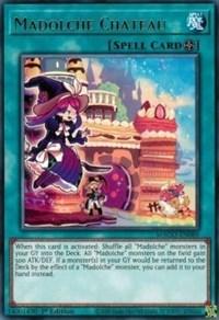 Madolche Chateau [MAGO-EN069] Rare is a Yu-Gi-Oh! Field Spell card depicted with whimsical, colorful artwork. It features a vibrant castle with an ornate design in pink and blue. The character in the foreground wears a whimsical outfit with a large hat, resembling a royally dressed baker holding pastries.