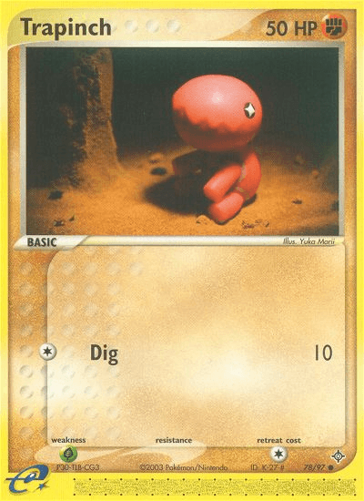 A Pokémon card featuring Trapinch with an HP of 50. The card is numbered 78/97. Trapinch is depicted as a red, ant-like creature in a desert setting. This common card from the Pokémon brand's EX: Dragon set mentions its move 