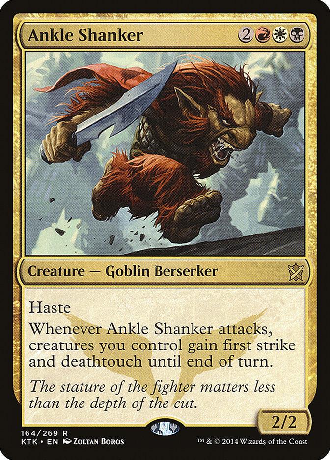 Ankle Shanker [Khans of Tarkir] is a thrilling Magic: The Gathering card. This Goblin Berserker costs two colorless, one red, one white, and one black mana. With 2/2 power and toughness, it boasts Haste and an ability that grants first strike and deathtouch to attacking creatures you control until the end of the turn.