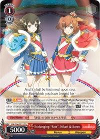 This image is of a trading card from the Revue Starlight series, featuring characters Hikari and Karen in dynamic poses, one holding a blue flag and the other a red flag. Part of a Trial Deck, it has detailed text and stats: 