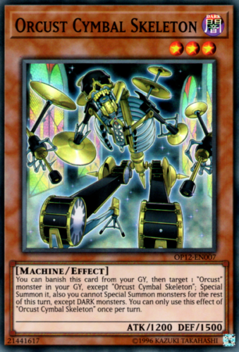 The image is a "Yu-Gi-Oh!" card featuring the Super Rare Orcust Cymbal Skeleton [OP12-EN007] from OTS Tournament Pack 12. It depicts a metallic skeleton playing a drum set, boasting an ATK of 1200, DEF of 1500, and showcasing its dark machine/effect attributes.