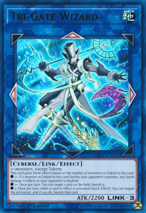A Yu-Gi-Oh! product titled **Tri-Gate Wizard [SDCL-EN042] Ultra Rare**. The card depicts a cybernetic, humanoid figure wielding a staff, surrounded by glowing blue energy and circuitry patterns. It is a Cyberse Link-3 monster with 2200 ATK points and the ability to banish opponent's cards.