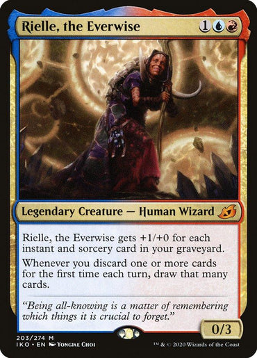 A Magic: The Gathering card from Ikoria: Lair of Behemoths, "Rielle, the Everwise [Ikoria: Lair of Behemoths]" costs one blue, one red, and one generic mana. This legendary creature - human wizard wields a staff depicted with swirling magical energy and has text detailing her abilities and flavor text about the importance of knowledge.