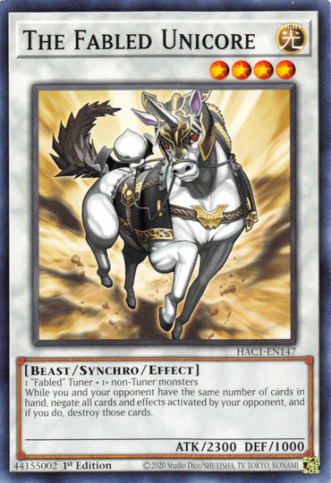 The image displays a "Yu-Gi-Oh!" trading card titled "The Fabled Unicore [HAC1-EN147] Common," depicting a majestic unicorn-like creature adorned with intricate armor, a glowing horn, and ethereal wings. This Synchro Monster card highlights its Fabled Tuner type, effects, and stats: ATK 2300, DEF 1000.