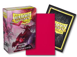 A Dragon Shield Dual Matte Japanese-size 60ct sleeve box titled "Fury" by Arcane Tinmen is upright with dragon and warrior artwork. An open pack displays a vibrant red sleeve, while another shows the Dragon Shield logo on textured black, highlighting their opaque quality.