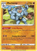 A Holo Rare Pokémon trading card featuring Machamp (088/196) [Sword & Shield: Lost Origin] from Pokémon. The card boasts 150 HP and is labeled as a Stage 2 Pokémon that evolves from Machoke. Machamp, depicted as a muscular, blue creature with four arms, has abilities "Crisis Muscles" and "Strong-Arm Lariat." It's card number 088/196.