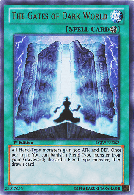 An image of the Yu-Gi-Oh! card "The Gates of Dark World [LCJW-EN253] Ultra Rare." The Field Spell card features an eerie gateway with dark energy and lightning in a mystical setting. It's a 1st edition Spell Card, LCJW-EN253, boosting Fiend-Type monsters and allowing draws under certain conditions.