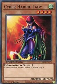 Trading card of "Cyber Harpie Lady [SBCB-EN173] Common" from the Yu-Gi-Oh! series. The image depicts a fierce purple-armored woman with red hair wielding a crystal-tipped staff, with fire in the background. Part of the Speed Duel Battle City Box, this card details her effect, type, and attack/defense points: ATK 1800, DEF 1300.