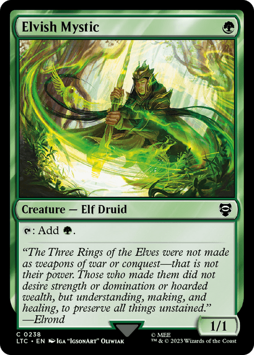 A Magic: The Gathering card titled "Elvish Mystic [The Lord of the Rings: Tales of Middle-Earth Commander]" features an Elf Druid dressed in green, casting a spell in a mystical forest. This green creature card costs one green mana and has a power/toughness of 1/1. Its ability is "Tap: Add one green mana." Flavor text includes an Elrond quote from The Lord of the Rings.