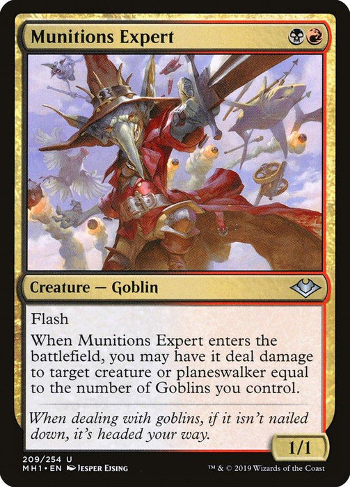 A Magic: The Gathering card titled "Munitions Expert [Modern Horizons]" has a vivid illustration of a goblin in a red trench coat and hat, brandishing a musket. The card's colors are red and black, with text describing its abilities, including dealing damage upon entering the battlefield. Illustrated by Jesper Ejsing.
