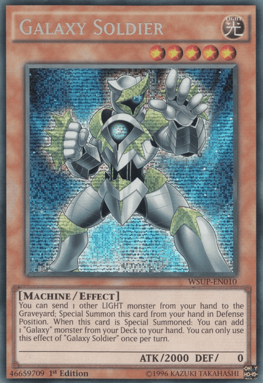 A Yu-Gi-Oh! trading card named "Galaxy Soldier [WSUP-EN010] Secret Rare" features a robot warrior with blue metallic armor, positioned in a defensive stance. The Secret Rare card's border is tan, with gold stars indicating its level. The text box describes the Effect Monster's type, ATK of 2000, and DEF of 0.