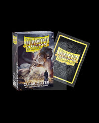 A box of Arcane Tinmen Dragon Shield: 100ct Outer Sleeves - Clear Matte (Standard) is displayed against a black background. The packaging features fantasy artwork of a person standing beside a large dragon. To the right of the box, a clear card sleeve with the Dragon Shield logo is partially pulled out for display, showcasing its superior card protection.