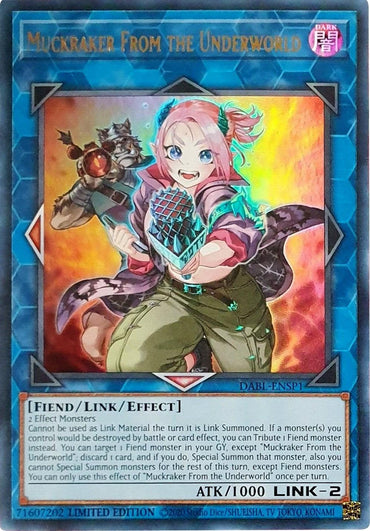 The image features the Yu-Gi-Oh! Ultra Rare card "Muckraker From the Underworld [DABL-ENSP1]," surrounded by a blue geometric design. It portrays a Fiend monster character equipped with a microphone, dressed in stylish gloves and boots. This Link/Effect Monster card includes two effect monsters and describes its unique capabilities.