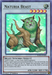 This Yu-Gi-Oh! card, Naturia Beast [DUPO-EN091] Ultra Rare, features a Synchro/Effect Monster that resembles a green tiger adorned with wooden horns and armor. Set against an enchanting mystical forest backdrop, it captures attention with its striking design. Classified as "BEAST/SYNCHRO/EFFECT," this card presents impressive statistics: ATK 2200 and DEF 1700, and highlights the unique abilities of an EARTH Tuner.